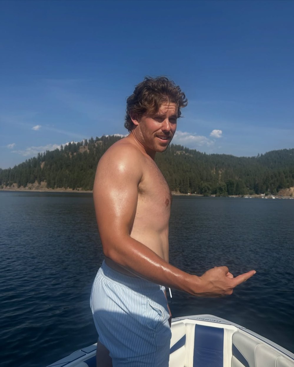 CHRISTOPHER SCHWARZENEGGER STUNS WITH 30-POUND WEIGHT LOSS AS HE ENJOYS SUNNY LAKE DAY WITH FAMILY